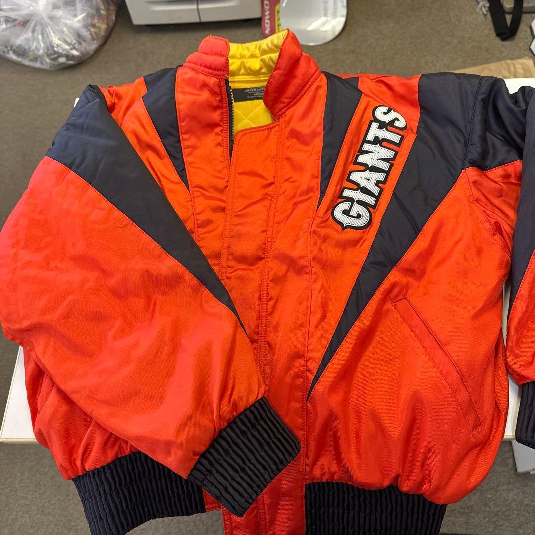 GIANTS ウォームアップジャケット オレンジ/ネイビー adidas（アディダス）の「adidas / ブロックド ウォームアップ